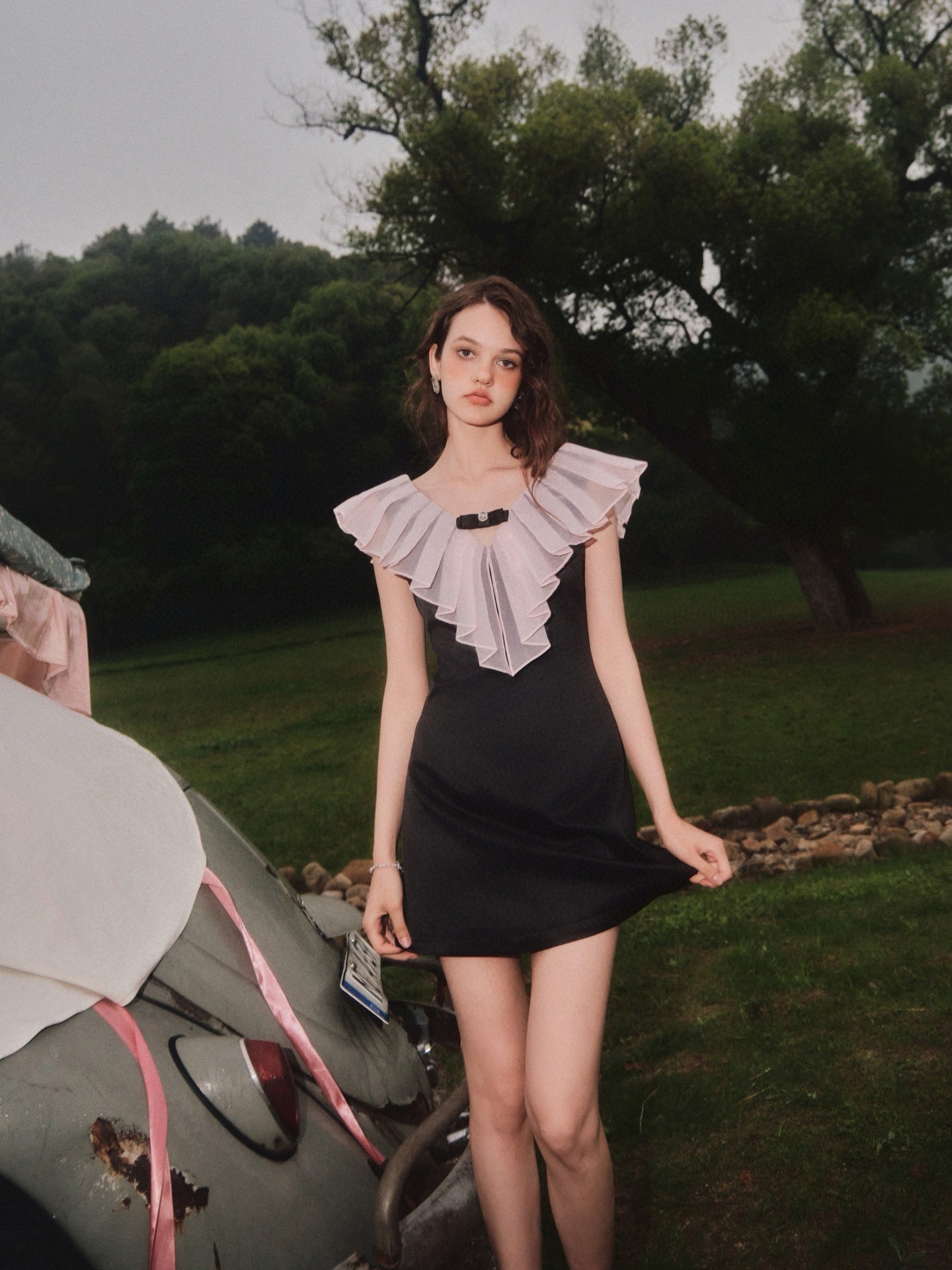 Pleated V-neck Bow-detail Mini Dress in Black