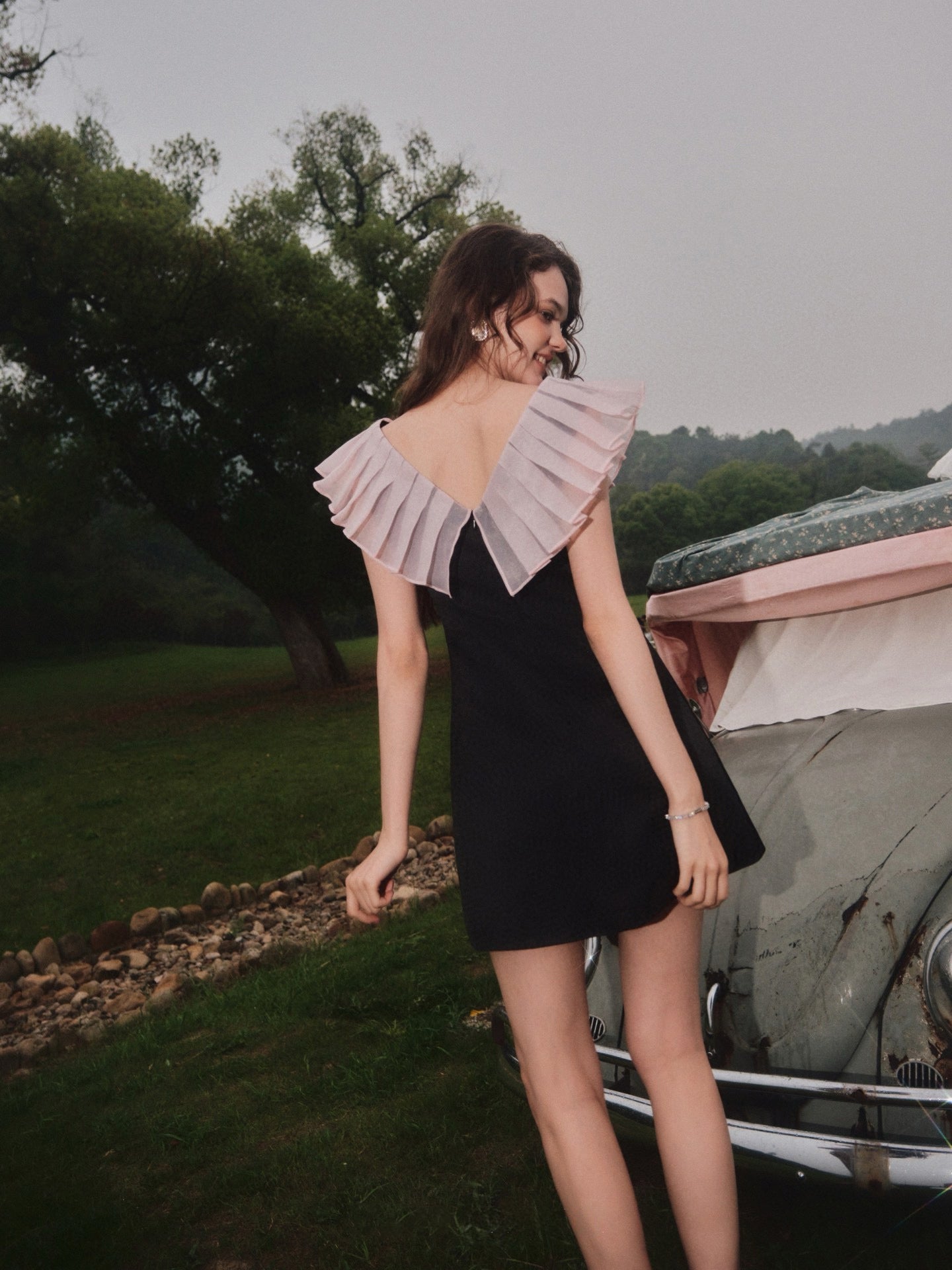 Pleated V-neck Bow-detail Mini Dress in Black