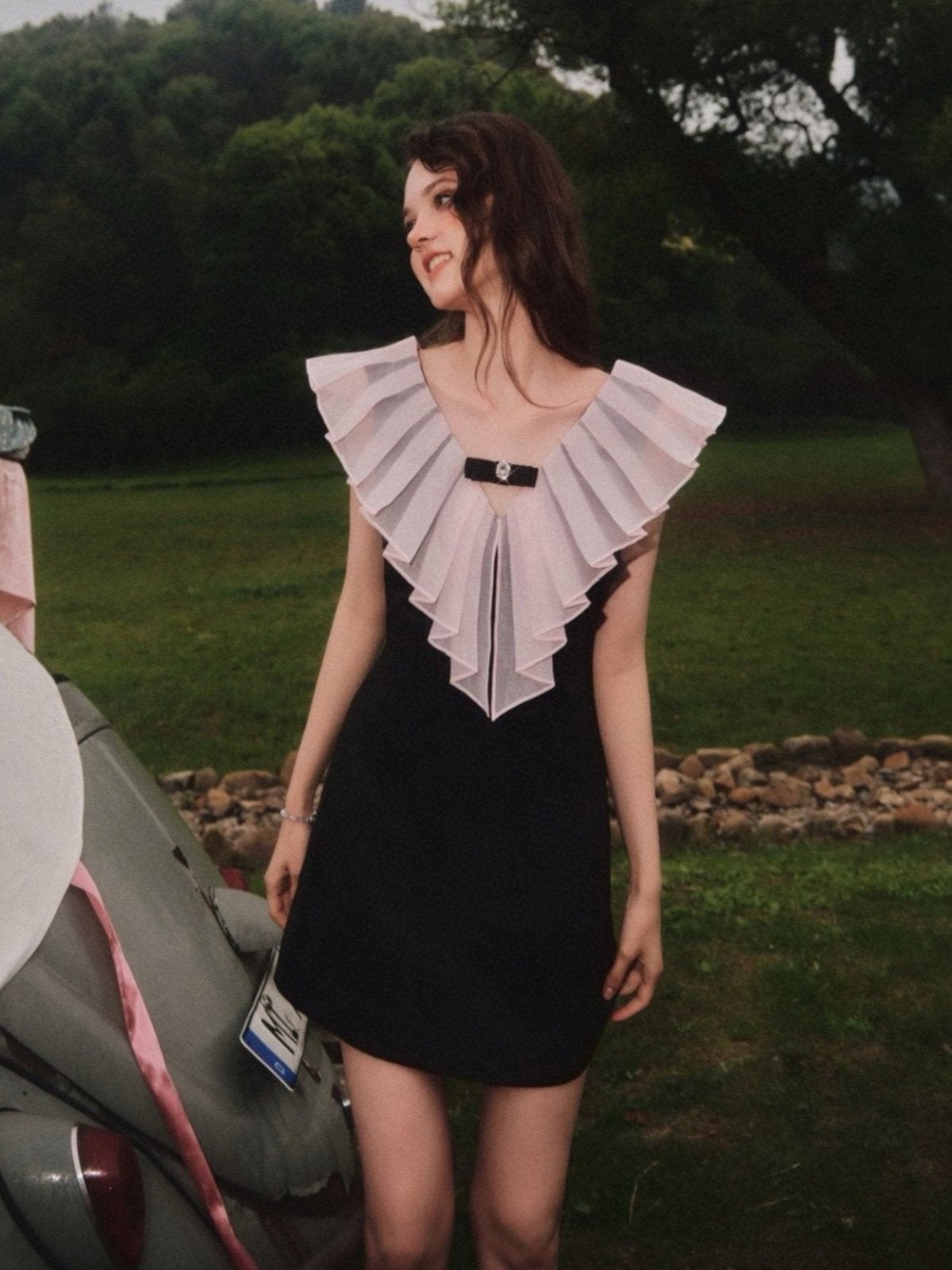 Pleated V-neck Bow-detail Mini Dress in Black